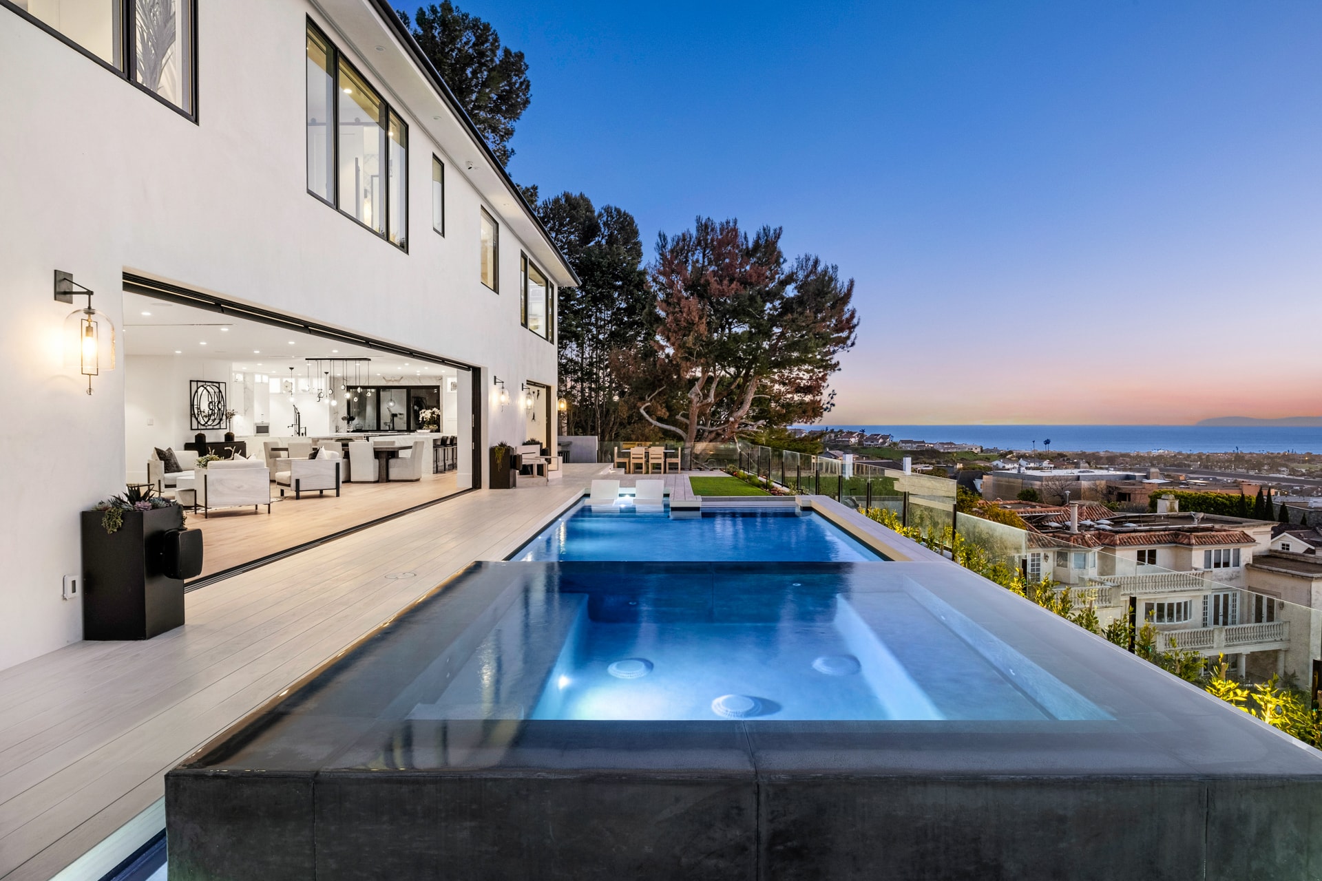 Open-concept living room and kitchen with indoor-outdoor flow