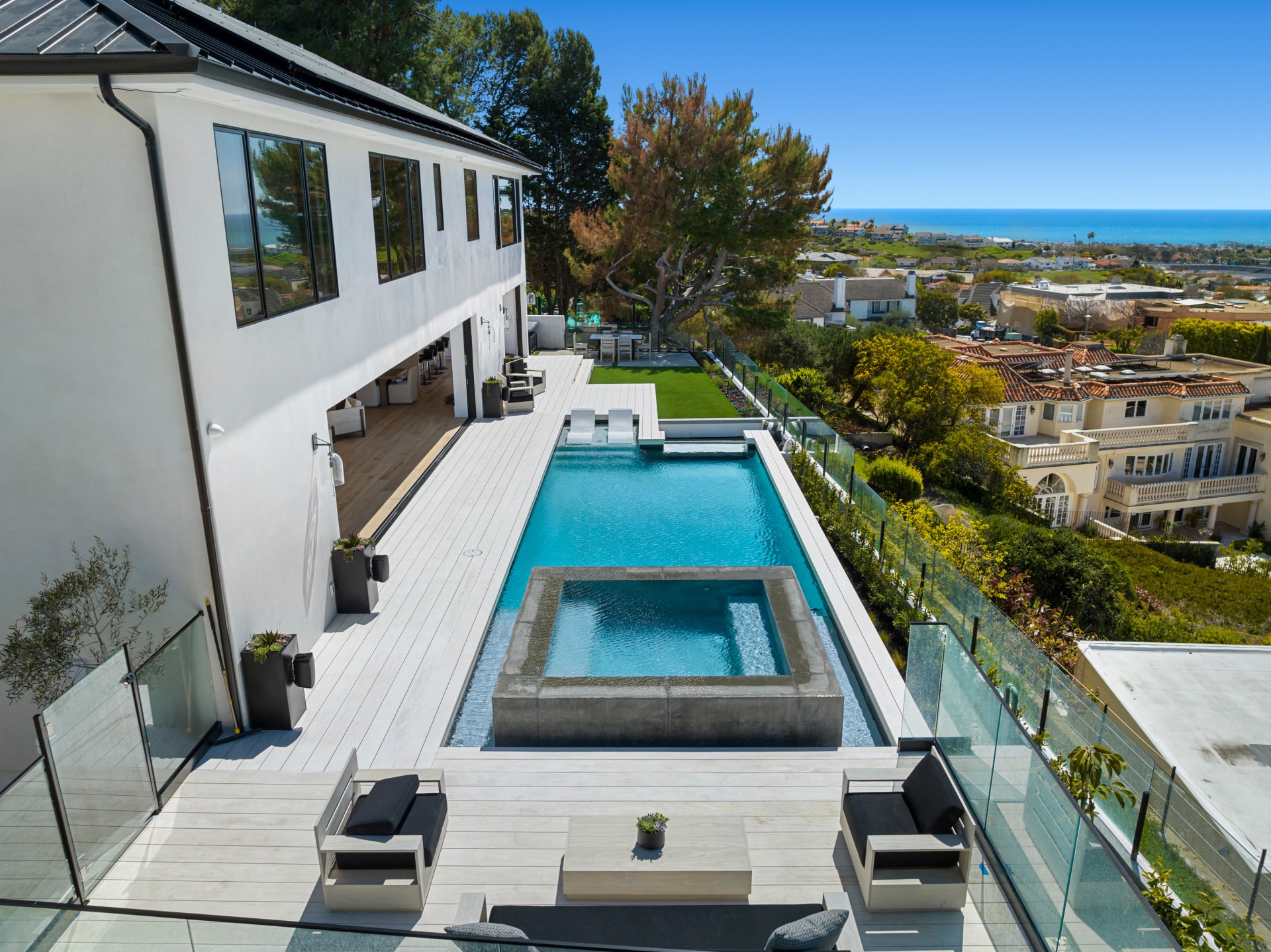 Modern coastal home with pool and ocean view